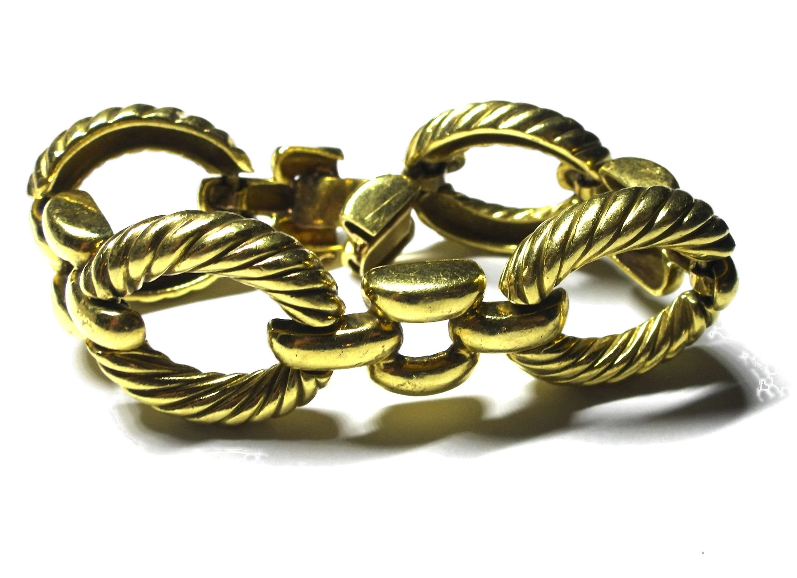 Chunky gold link bracelet, Jon Bragman, Inc. South Florida